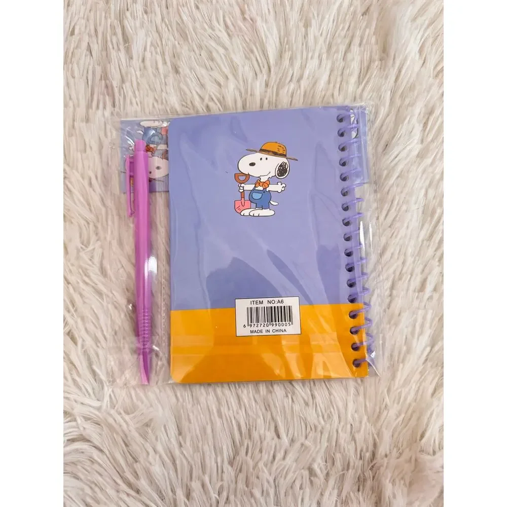 Snoopy spiral notebook and pen set with Snoopy in a hat and overalls size A6